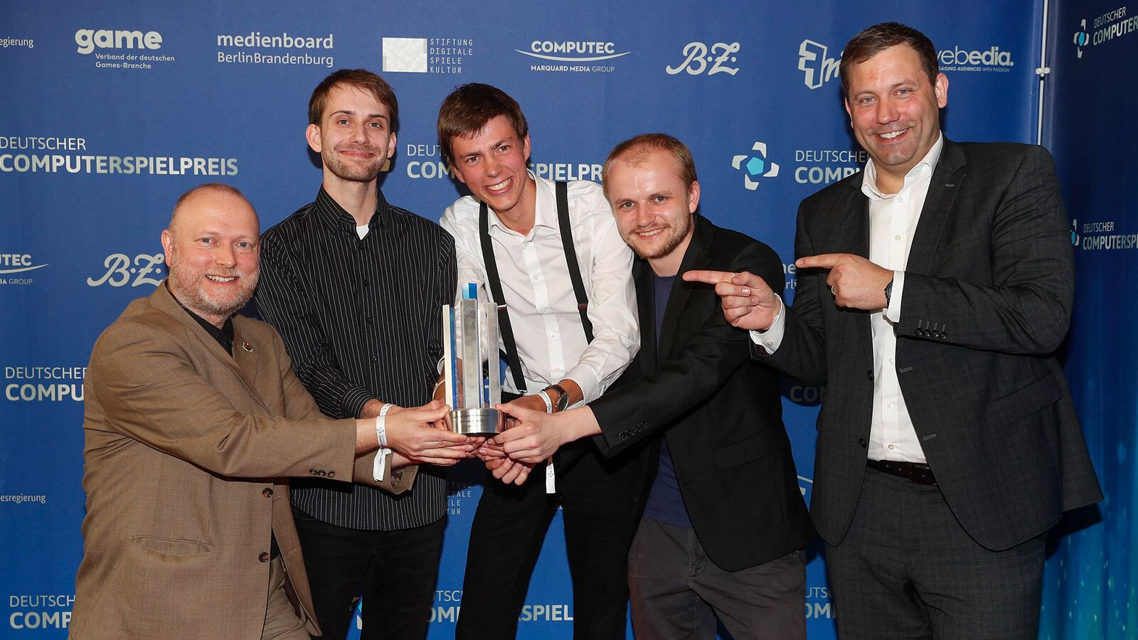 Das Team von A Juggler's Tale mit ihrem Deutschen Computerspielpreis