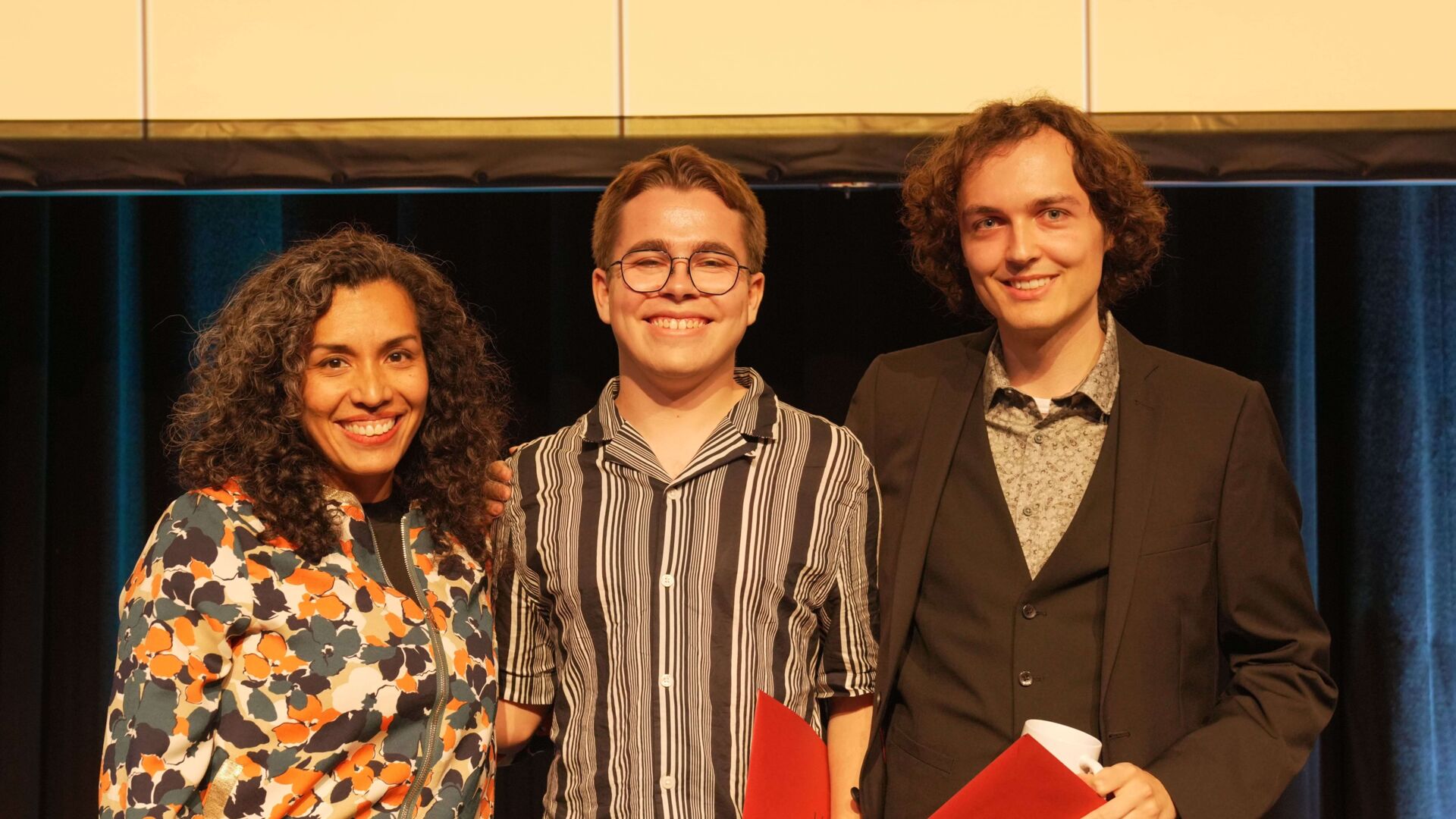 group picture of our two Technical Directing graduates